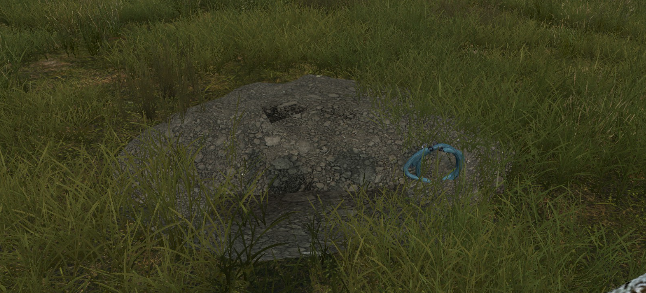 The dug-out dirt pile that forms the base of the hatch