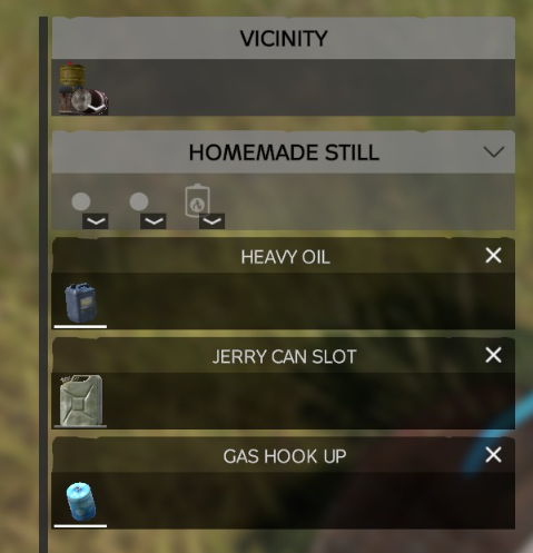 The still's attachment slots with motor oil and a jerry can